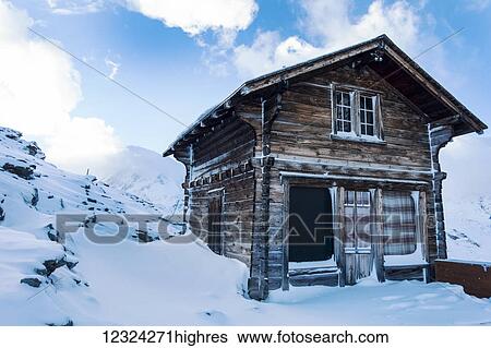 Stock Photograph - Traditional chalet on Gornergrat summit, Monte Rosa, Pennine Alps; Zermatt, Valais, Switzerland. Fotosearch