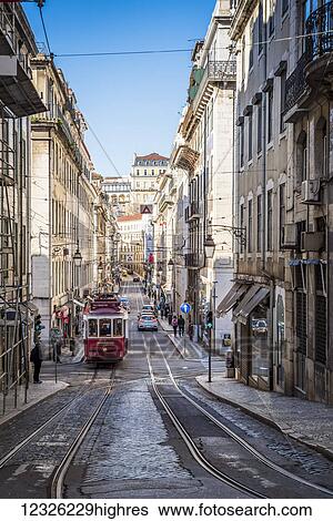 Tram on a street in Baixa; Lisbon, Portugal View Large Photo Image Stock Photograph - Tram on a street in Baixa; Lisbon, Portugal. Fotosearch