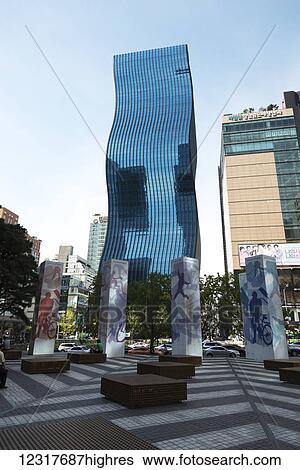 Unique skyscraper with curved glass facade; Seoul, Korea View Large Photo Image Stock Photograph - Unique skyscraper with curved glass facade; Seoul, Korea. Fotosearch