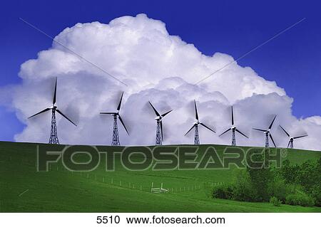Stock Image - Wind generators with clouds in background. Fotosearch