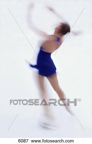 Woman figure skating View Large Photo Image Stock Photo - Woman figure skating. Fotosearch
