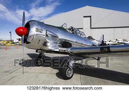 World War II airplane parked at a hangar during the Alaska Airmen's Air show, Anchorage, Southcentral Alaska, USA View Large Photo Image Stock Photograph - World War II airplane parked at a hangar during the Alaska Airmen's Air show, Anchorage, Southcentral Alaska, USA. Fotosearch