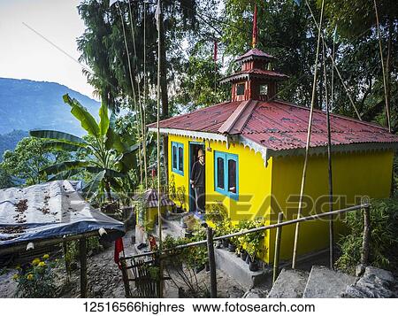 A bright yellow building on the Glenburn Tea Estate; Singringtam, West Bengal, India View Large Photo Image Stock Photograph - A bright yellow building on the Glenburn Tea Estate; Singringtam, West Bengal, India. Fotosearch