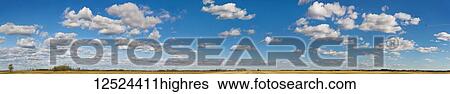 A combine is harvesting crops under a beautiful autumn sky in the Edmonton area; Alberta, Canada View Large Photo Image Stock Photograph - A combine is harvesting crops under a beautiful autumn sky in the Edmonton area; Alberta, Canada. Fotosearch