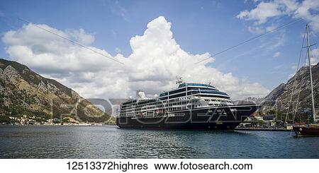 A cruise ship mooring in the port of Kotor, in the Bay of Kotor; Kotor, Kotor Municipality, Monte View Large Photo Image Stock Photograph - A cruise ship mooring in the port of Kotor, in the Bay of Kotor; Kotor, Kotor Municipality, Monte. Fotosearch