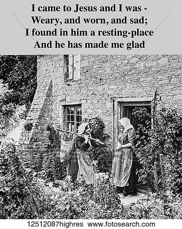 Stock Photograph - A hand coloured magic lantern slide circa 1900, A slide promoting a christian message using pictures and text. Two old ladies gathering firewood standing chatting at the cottage door. Fotosearch
