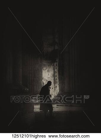 A magic lantern slide shows a silhouetted man stands inside the Cathedral of Reims after the shelling by German troops in 1914; Reims, France View Large Photo Image Stock Photograph - A magic lantern slide shows a silhouetted man stands inside the Cathedral of Reims after the shelling by German troops in 1914; Reims, France. Fotosearch