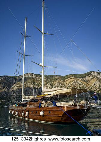 A sailing yacht in the Bay of Kotor; Kotor, Monte View Large Photo Image Stock Photograph - A sailing yacht in the Bay of Kotor; Kotor, Monte. Fotosearch