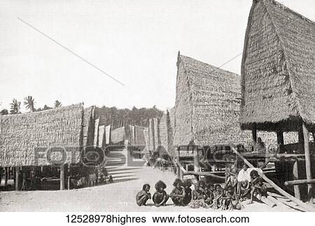 Stock Photograph - A villiage in New Guinea, Oceania in the late 19th century. From The Wonders of the World, published c. 1920.. Fotosearch
