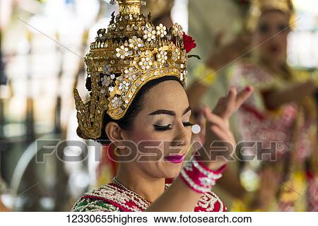 Stock Photograph - A Young Woman At A Traditional Dance; Bangkok, Thailand. Fotosearch