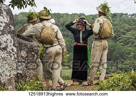 Actors dressed as Pathet Lao soldiers and women in traditional costume at Site 2, Plain of Jars; Xiangkhouang, Laos View Large Photo Image Stock Photograph - Actors dressed as Pathet Lao soldiers and women in traditional costume at Site 2, Plain of Jars; Xiangkhouang, Laos. Fotosearch