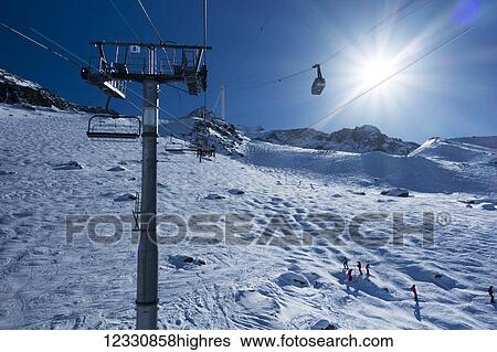 Aerial Lift At A Ski Resort, Aiguille Ges Grands Montets; Chamonix, France View Large Photo Image Stock Photograph - Aerial Lift At A Ski Resort, Aiguille Ges Grands Montets; Chamonix, France. Fotosearch
