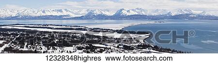 Stock Photograph - Aerial Scenic Of Homer, Kachemak Bay, And Kenai Mountains In Winter, Southcentral Alaska, USA. Fotosearch