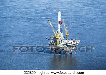Aerial View Of A Drill Rig In Cook Inlet, Southcentral Alaska, USA View Large Photo Image Stock Photograph - Aerial View Of A Drill Rig In Cook Inlet, Southcentral Alaska, USA. Fotosearch
