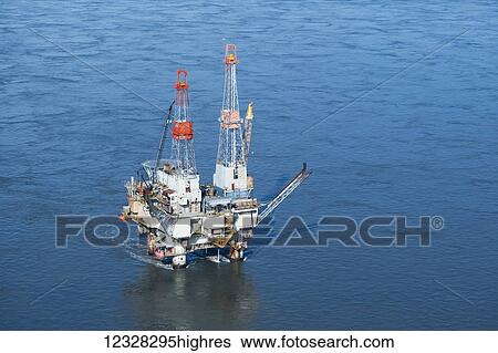 Aerial View Of A Drill Rig In Cook Inlet, Southcentral Alaska, USA View Large Photo Image Stock Photograph - Aerial View Of A Drill Rig In Cook Inlet, Southcentral Alaska, USA. Fotosearch