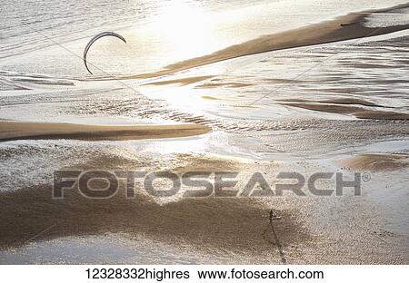Stock Photograph - Aerial View Of A Kite Surfer On The Beach At Homer, Southcentral Alaska, USA. Fotosearch