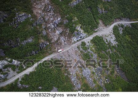 Stock Photograph - Aerial View Of A Semi Truck On The Williamsport-Pile Bay Road, Southcentral Alaska, USA. Fotosearch