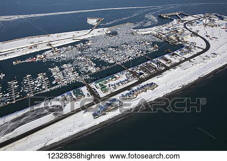 Stock Photograph - Aerial View Of The Homer Small Boat Harbor In Winter, Homer Spit, Southcentral Alaska, USA. Fotosearch