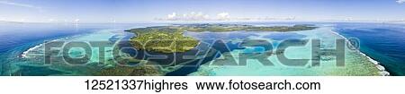 Stock Photograph - Aerial view of the outer reef and Goofnuw Channel looking south to the island of Yap; Yap, Micronesia. Fotosearch