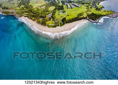Stock Photograph - Aerial view of the Ritz-Carlton Hotel Kapalua, DT Fleming Beach Park, Honokahua Bay and Makaluapuna Point; Lahaina, Maui, Hawaii, United States of America. Fotosearch