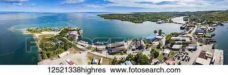 Stock Photograph - Aerial view of the town of Colonia and Tomil Harbour on the island of Yap; Yap, Federated States of Micronesia.. Fotosearch