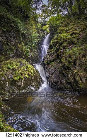 Stock Photograph - Aira Force waterfall in the English Lake District. Land owned by The National Trust.. Fotosearch
