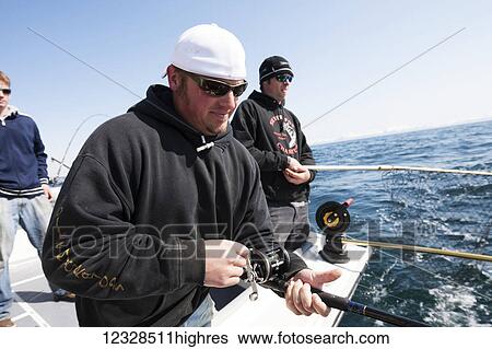 Anglers halibut fishing in Kachemak Bay, South-central Alaska; Homer, Alaska, United States of America View Large Photo Image Stock Photograph - Anglers halibut fishing in Kachemak Bay, South-central Alaska; Homer, Alaska, United States of America. Fotosearch