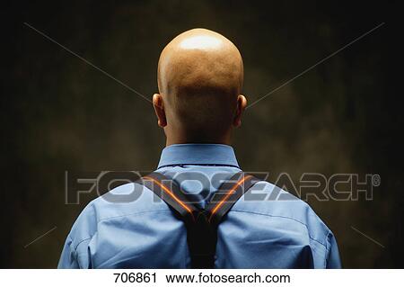 Stock Image - Back of man's head. Fotosearch