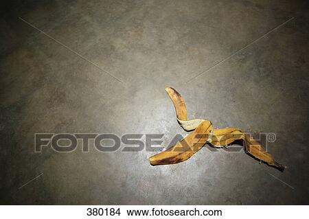 Picture - Banana peel on floor. Fotosearch