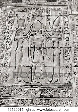 Bas-reliefs on the temple at Dendera, Egypt showing a Ptolemaic Pharaoh being crowned by the goddesses Nekhbet and Wadjet, patronesses respectively of Upper and Lower Egypt, with the double crown of these dominions. From The Wonders of the World,... View Large Photo Image Stock Photograph - Bas-reliefs on the temple at Dendera, Egypt showing a Ptolemaic Pharaoh being crowned by the goddesses Nekhbet and Wadjet, patronesses respectively of Upper and Lower Egypt, with the double crown of these dominions. From The Wonders of the World,.... Fotosearch