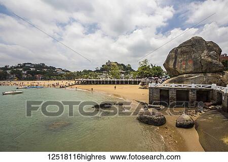 Stock Photograph - Beach along Kulangsu, a historic international settlement; Xiamen, Fujian, China. Fotosearch