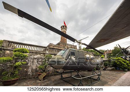Stock Photograph - Bell UH-1 Iroquois (nicknamed Huey) utility military helicopter on display at the Vietnam Military History Museum; Hanoi, Vietnam. Fotosearch