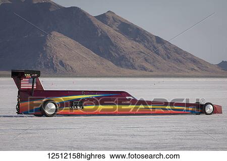 Stock Photograph - Blown Fuel Lakester AA/BFL at speeed on Bonneville Salt Flats during Bonneville Speed Week 2017; Wendover, Utah, United States of America. Fotosearch