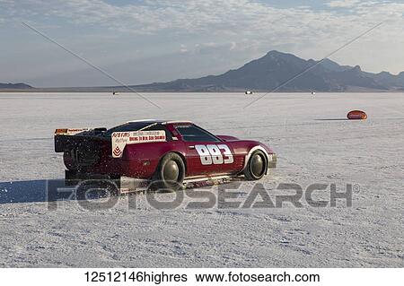 Stock Photograph - Blown Fuel Modified Sports Class A/BFMS Motorhead Racing 1992 Chevy Corvette takes a run at 257. 768 mph record on Bonneville Salt Flats during Bonneville Speed Week 2017; Wendover, Utah, United States of America. Fotosearch