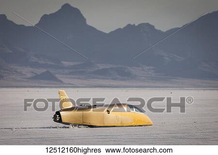 Blown Fuel Streamliner Class A/BFS of Speed Demon Racing with Chevy 444 V-8 in 2016 Streamliner at speed attempting to break 409. 986 mph record on Bonneville Salt Flats during Bonneville Speed Week 2017; Wendover, Utah, United States of America View Large Photo Image Stock Photograph - Blown Fuel Streamliner Class A/BFS of Speed Demon Racing with Chevy 444 V-8 in 2016 Streamliner at speed attempting to break 409. 986 mph record on Bonneville Salt Flats during Bonneville Speed Week 2017; Wendover, Utah, United States of America. Fotosearch
