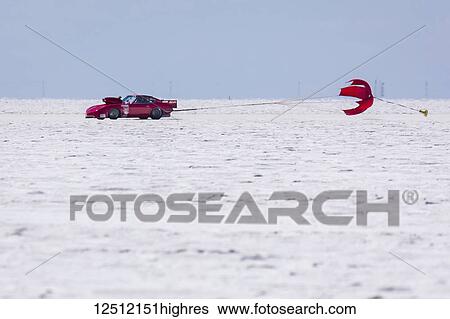 Stock Photograph - Blown Gas Modified Sports Class F/BGMS a 1972 Datsun 240Z pops chute after run at 220. 615 mph record on Bonneville Salt Flats during Bonneville Speed Week 2017; Wendover, Utah, United States of America. Fotosearch