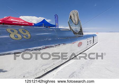 Stock Photograph - Blown Gas Streamliner Class B/BGS by Haas Racing on starting line at Bonneville Salt Flats during Bonneville Speed Week about to try to beat record of 308. 816 mph in class; Wendover, Utah, United States of America. Fotosearch