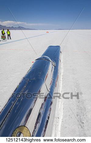 Stock Photograph - Blown Gas Streamliner Class B/BGS by Haas Racing on starting line at Bonneville Salt Flats during Bonneville Speed Week about to try to beat record of 308. 816 mph in class; Wendover, Utah, United States of America. Fotosearch