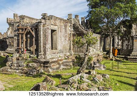 Stock Photograph - Buddhist monks in Gopura II; Preah Vihear, Cambodia. Fotosearch