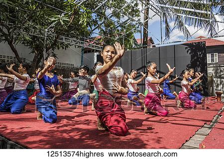 Stock Photograph - Cambodian girls practicing Khmer classical dances at the School of Art; Siem Reap, Cambodia. Fotosearch