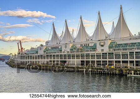 Stock Photograph - Canada Place, the cruise ship terminal in Burrard Inlet; Vancouver, BC, Canada. Fotosearch