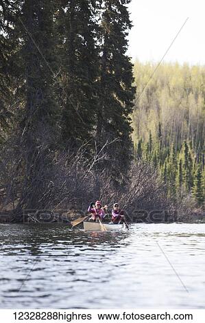 Stock Photograph - Canoers In The Swanson Lake Area, Kenai Peninsula, Alaska.. Fotosearch