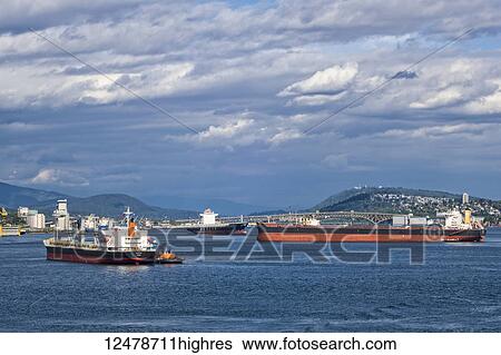 Cargo ships in the Vancouver harbour; Vancouver, British Columbia, Canada View Large Photo Image Stock Photograph - Cargo ships in the Vancouver harbour; Vancouver, British Columbia, Canada. Fotosearch