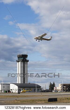 Cessna 150 In Flight At Merrill Field, Anchorage, Southcentral Alaska, USA View Large Photo Image Stock Photograph - Cessna 150 In Flight At Merrill Field, Anchorage, Southcentral Alaska, USA. Fotosearch