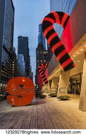 Christmas Decorations In Mid-Town Manhattan, 9 West 57th Street; New York City, New York, United States Of America View Large Photo Image Stock Photograph - Christmas Decorations In Mid-Town Manhattan, 9 West 57th Street; New York City, New York, United States Of America. Fotosearch