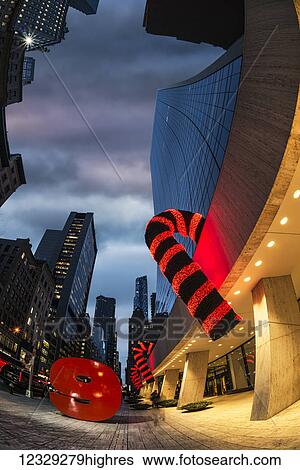Christmas Decorations In Mid-Town Manhattan, 9 West 57th Street; New York City, New York, United States Of America View Large Photo Image Stock Photograph - Christmas Decorations In Mid-Town Manhattan, 9 West 57th Street; New York City, New York, United States Of America. Fotosearch