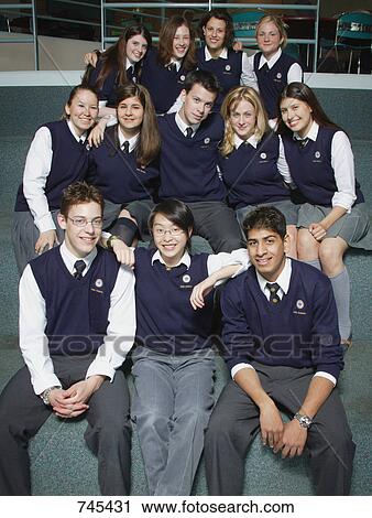 Stock Image - Class of students in uniform. Fotosearch