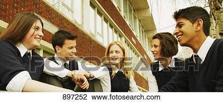 Stock Image - Classmates hanging out. Fotosearch