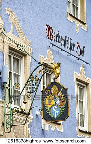 Close-up of a metal gold sign on side of colourful building; Grainau, Bavaria, Germany View Large Photo Image Stock Photograph - Close-up of a metal gold sign on side of colourful building; Grainau, Bavaria, Germany. Fotosearch