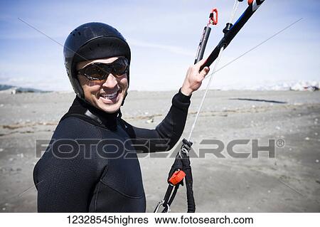 Close-up portrait of a kitesurfer on the beach during an instruction class, Kachemak Bay, South-central Alaska; Alaska, United States of America View Large Photo Image Stock Photograph - Close-up portrait of a kitesurfer on the beach during an instruction class, Kachemak Bay, South-central Alaska; Alaska, United States of America. Fotosearch